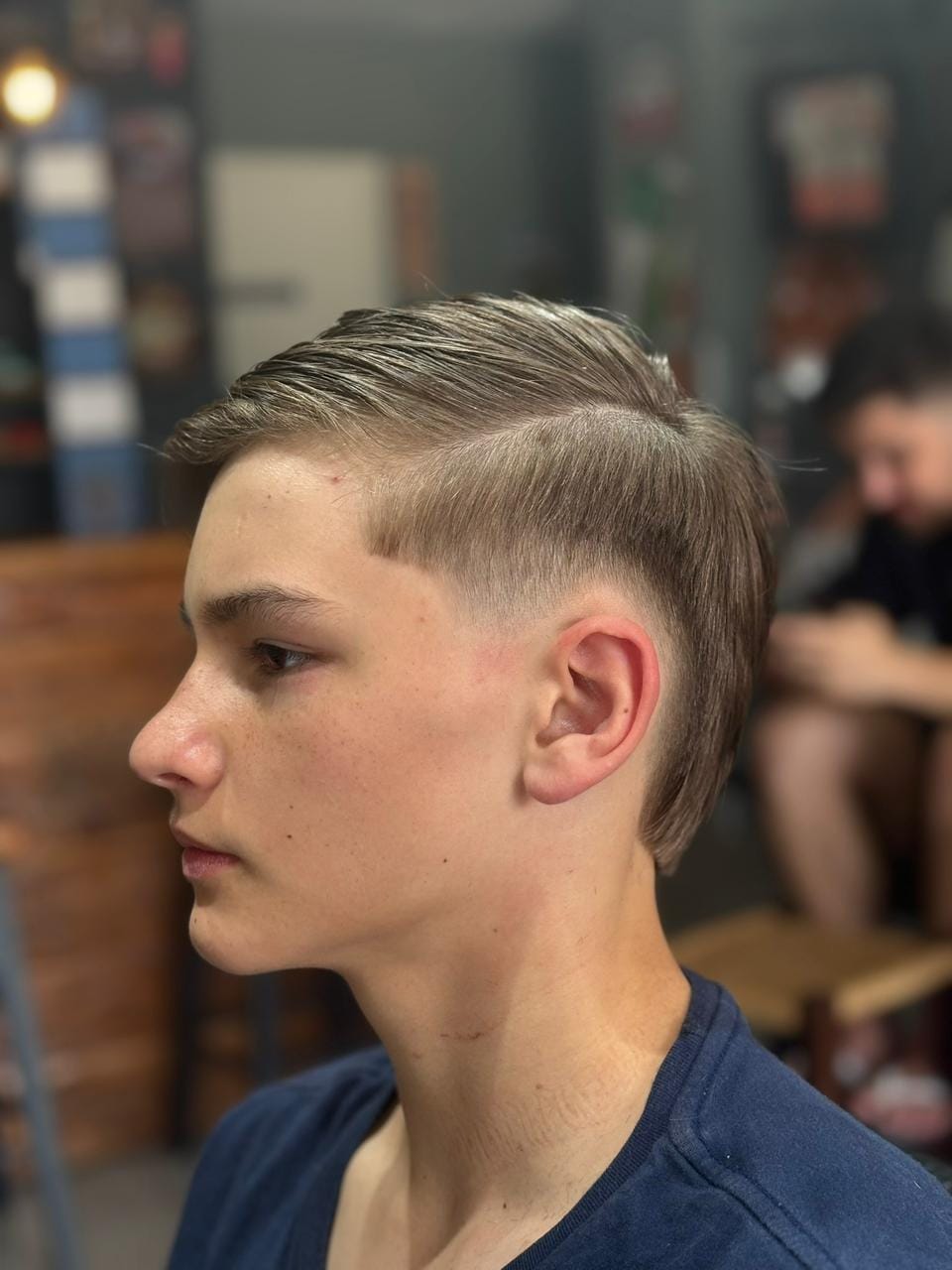Cliente com cabelo curto e barba aparada